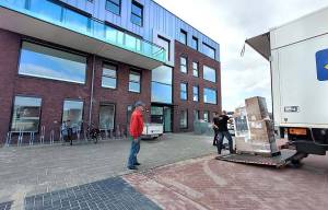 Nieuwe bewoners trekken in appartementencomplex